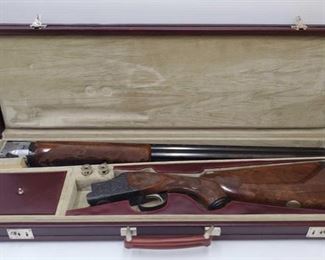 500: Winchester 101 Silver Anniversary Over and Under 12ga Shotgun #40 in Case
Serial Number: WSA12-040E Barrel Length: 28"
