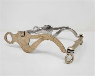 1004: Garcia Saddle Co Silver Curve Show Bit, 600g
Garcia Saddle Co Silver Bit Total weight approx 600g Shank measures approx 9"