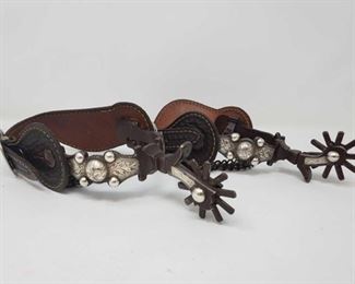 1011: Sterling Silver Pair of Spurs, 700g
Pair of Spurs Total weight approx 700g Shank measures approx 2.5"