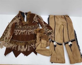 1095: Childrens Native American Costume
Torso measures approx 25", arms measure approx 18" Pant legs measure approx 26", waste measures approx 24" Shoes measures approx 7"x4"