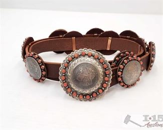 1098: Native American Sterling Silver Coral Concho Belt w/ Morgan Silver Dollar Conchos Signed by Artist
This Rare Native American Concho belt. Has 12 Conchos not including the belt Buckle. The Belt is made out of Sterling Silver and Authentic Morgan Silver Dollars a 100 years old. The conchos are accented with blood red coral. This is a one of a kind Belt. The leather belt Strap measures 46in. Can Be adjusted to fit any size.
Low Estimate: 2000.00
High Estimate: 3000.00
