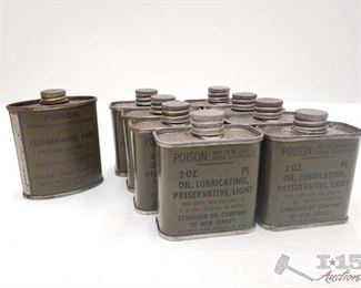#970 • Nine Metal 2oz Cans of Gun Oil