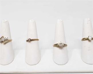 1251: Four 10k Gold Rings, 8.4g
Four 10k gold rings All together rings weigh 8.4g Ring sizes are approximately 6.5, 7, 9,