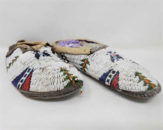 #1048 • Native American Pair of Moccasins measures approx 10 ' x 3.5"