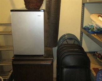 Folding chairs and small refrigerators