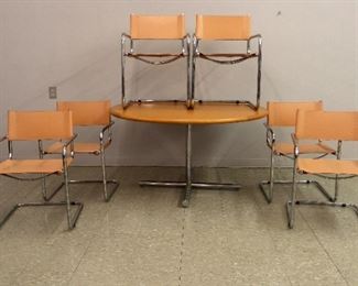 Cantilever Armchairs by Mark Stam, 60 inch stainless steel table