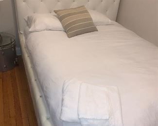 Full size white and glitter tufted bed headboard and bed-frame.  Mattress is free