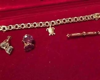 14k earrings, charm bracelet and bar pin