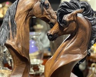 Signed horse head statues