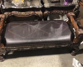 Leather carved wood bench