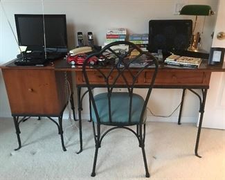 Desk with filing cabinet and chair