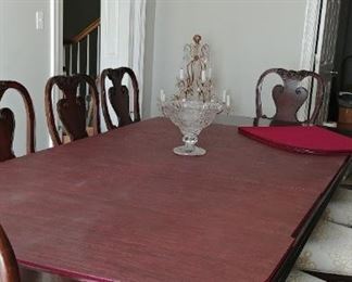 Large elegant dining room table and 8 chairs.