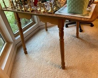 #20 laminate wood drop side table 28-45x 30x29 $75.00