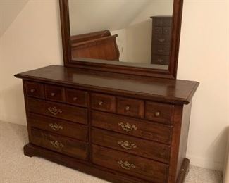#49 dark pine 8 drawer dresser w/mirror 60x20x33 mirror 45x33 $175.00