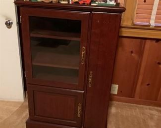 #48 Laminate stereo cabinet w/ cd/dvd holder $30.00