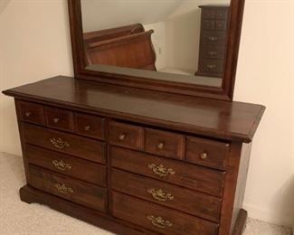 #49 dark pine 8 drawer dresser w/mirror 60x20x33 mirror 45x33 $175.00