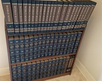 #4  Wood bookcase with 3 shelves 28.5x8x28 encyclopedias included  $ 45.00