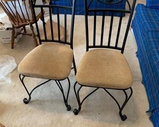 #23 2 metal dining chairs back 40" tall $ 80.00