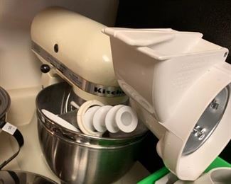 #53 Kitchen Aid cream colar mixer w meat rinder, 2 pattles, whipper, dough hook, bowl guard,and more assessarys $ 200.00