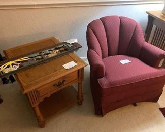 Swivel rocker
Antique ironwork piece with animals
End table
