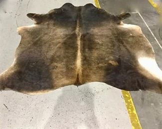 Cowhide Rug https://ctbids.com/#!/description/share/275849