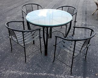 Five Piece Patio Set With Glass Topped Table (29" High x 36" Dia.) And 4 Matching Steel Chairs