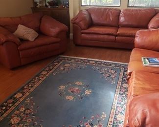 RUGS,2 LEATHER SOFA, OVERSIZE CHAIR AND OTTOMAN