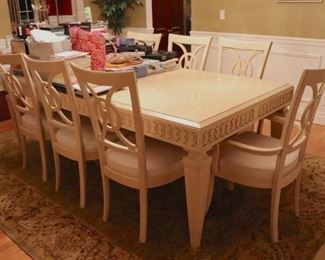 Light Wood and has 8 Chairs & China Cabinet