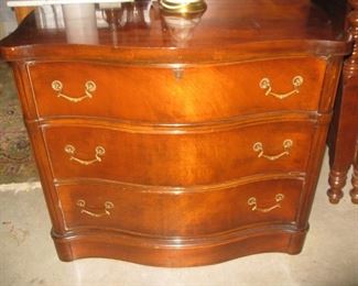 serpentine front chest of drawers