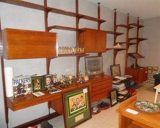 Six sections, plus two extra poles and about six shelves with all the wooden brackets.