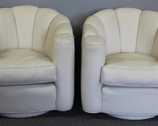 Pair of Leather Upholstered Swivel Chairs