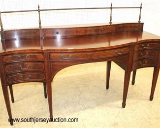  Mahogany “Baker Furniture” 7 Drawer Bow Front Inlaid Taper Leg Sideboard with Gallery

Auction Estimate $500-$1000 – Located Inside 