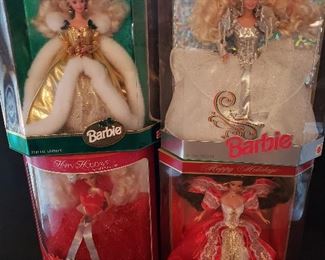 Happy Holiday Barbie, all new in unopened boxes. Includes 1st in series, 1988; also 1991 - 1998