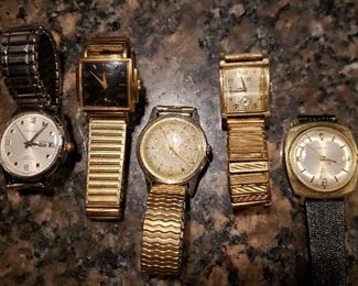 Old watches. A couple of Caravelle watches (both keep time, the one with day/date keeps time, but the day/date function needs work), Waltham Halmark art deco and a Gruen Veri-thin (Waltham and Gruen do not work) 
