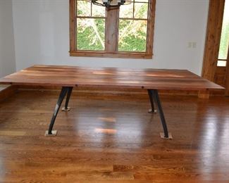 District Eight Ping Pong table. Striking and resilient, the gaming table features a pedestal base rendered from reclaimed cast iron machine parts with a hard fumed oak playing surface.
SMOKED oak top / black cast iron base
dimensions 108″ x 59-70″ x 29.5-36.5″
distance between legs length 73.3″
distance between legs width 48.5″
distance leg to edge - length 19″
distance leg to edge - width 4″