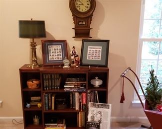 Bookcase with Lincoln and Washington books signed copies of Taken For A Ride co-authored by our clients son