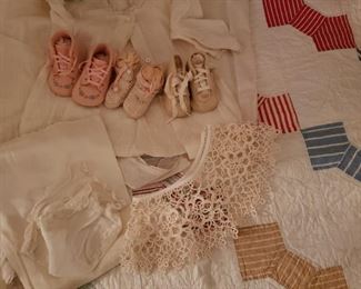 Vintage baby shoes and baby quilts