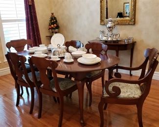 Mahogany table, two armchairs and four side chairs also purchased from M.J.'s Estate Sales