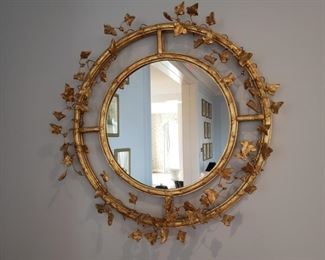 Gold leaf mirror one of two , appr. 42 inches round from one leaf to the other!!!
