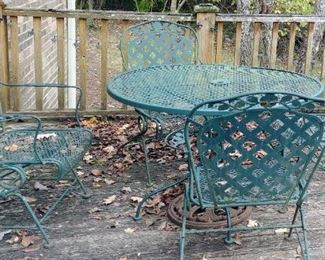 Vintage wrought iron table and four chairs