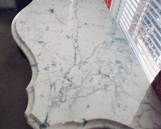 Closeup of the marble top with beveled edge