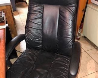 Executive leather swivel and adjustable office chair