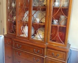 Beautiful antique mahogany China cabinet with bubble glass