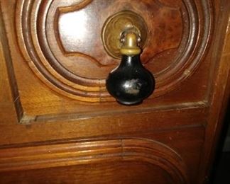 Closeup view of dresser hardware