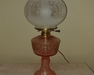Pink depression glass globe lamp