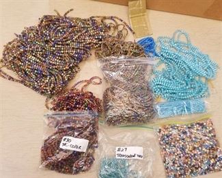 large assortment of jewelry beads and beaded strands