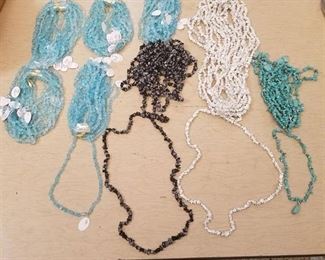 approximately 80 assorted beaded strands