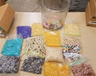 large lot of assorted jewelry beads and big jar