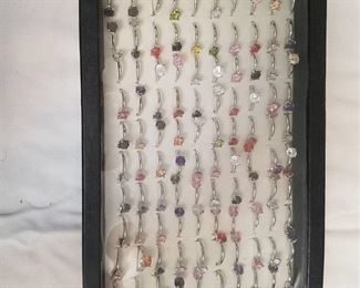 approximately 100 assorted rings