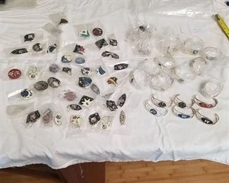 approximately 30 bracelets and 40 sets of earrings